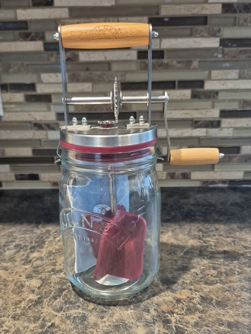 Hand-Crank Glass Butter Churn with Wooden Handle and Red Trim